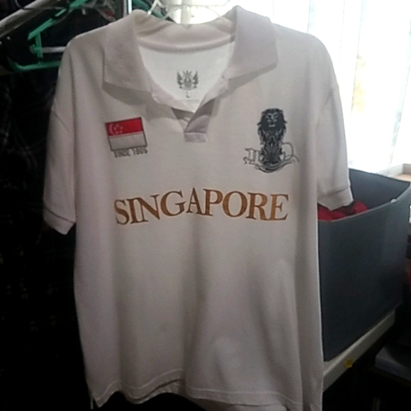 collared short sleeved polo style shirt - Picture 1 of 1